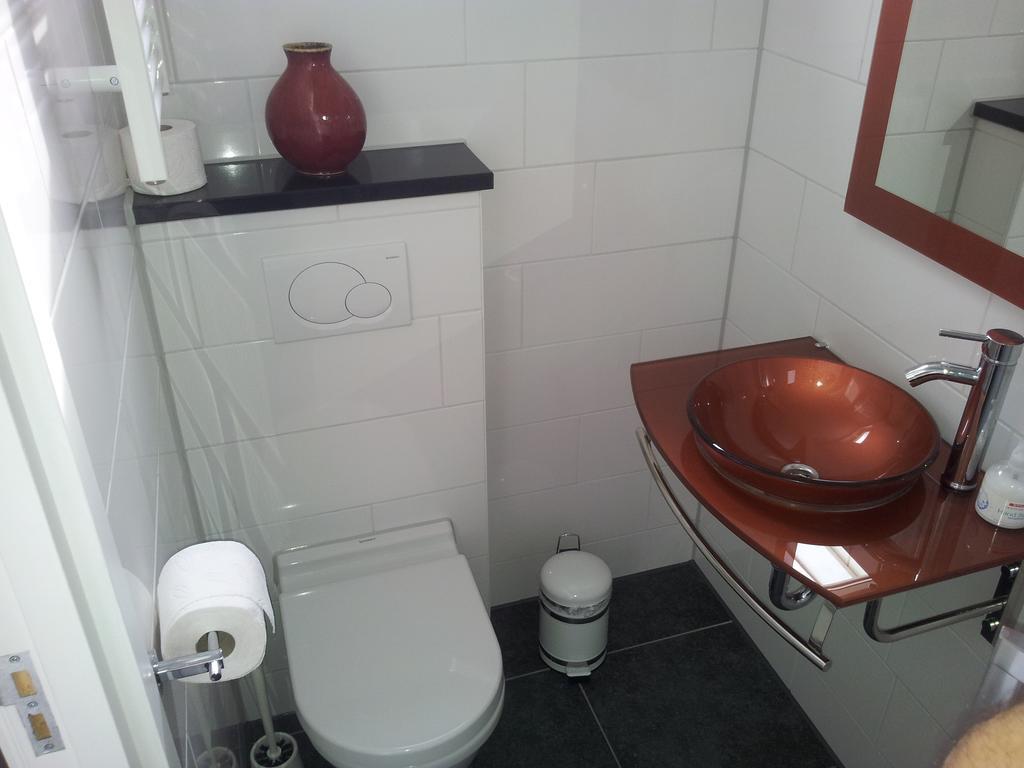 Homestay Bij Aelita Den Burg Rum bild